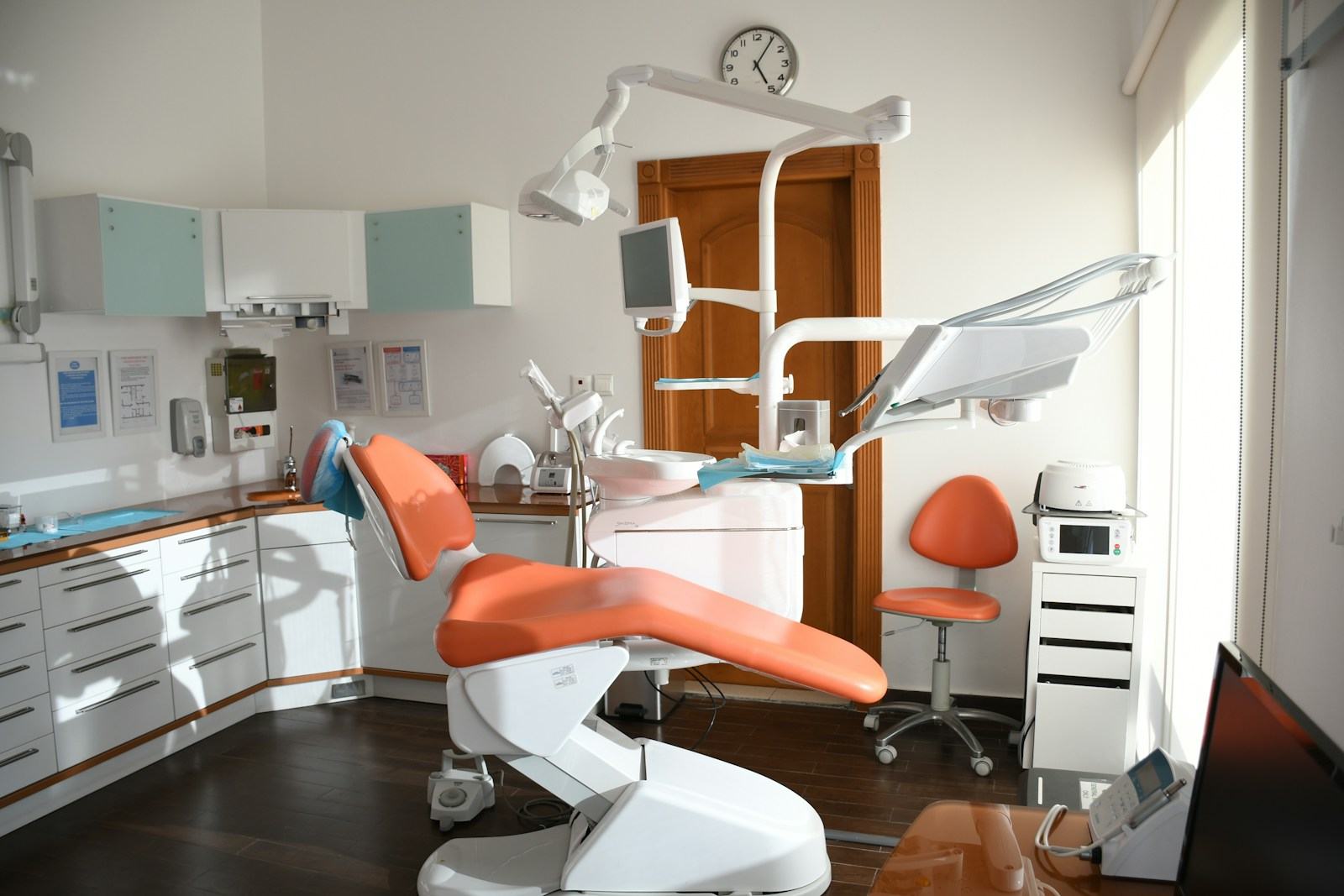 Treatment room with a modern dental chair